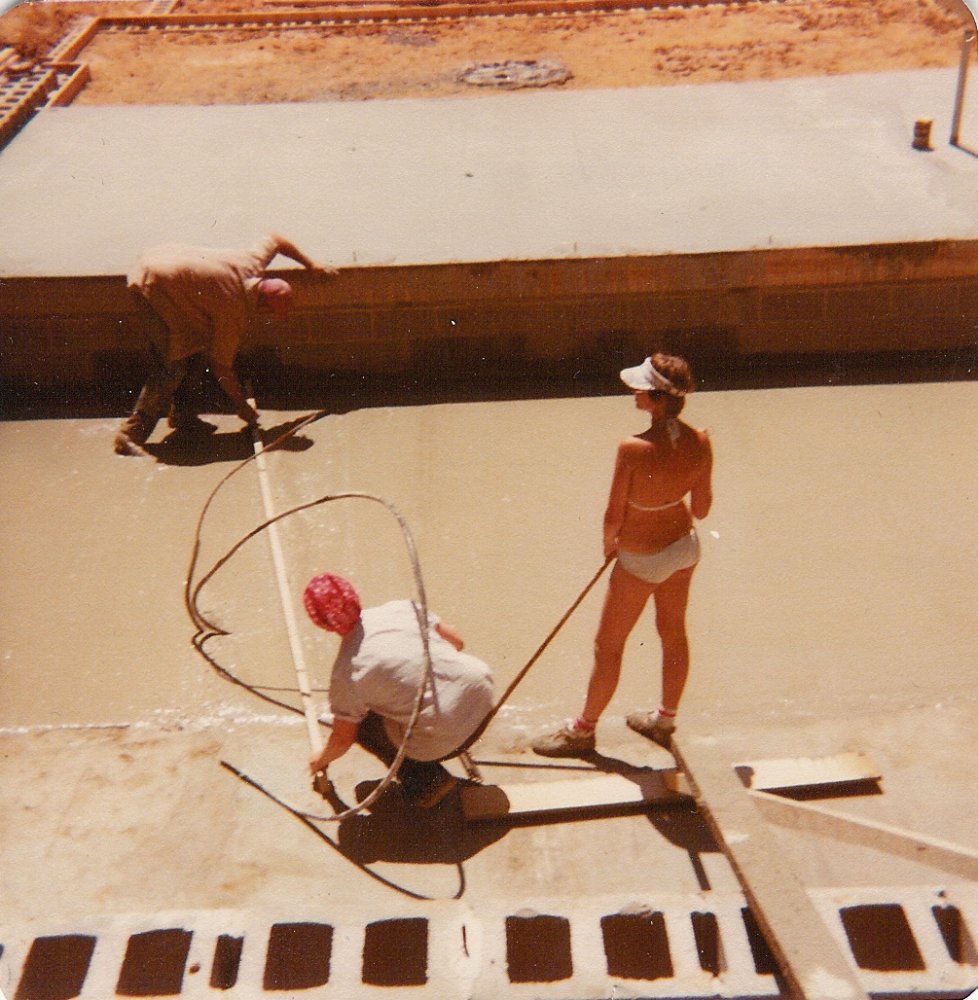 Sandra showing off her tan while Ma and Pa work.