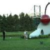 Couple posing in front of Spoonbridge and Cherry